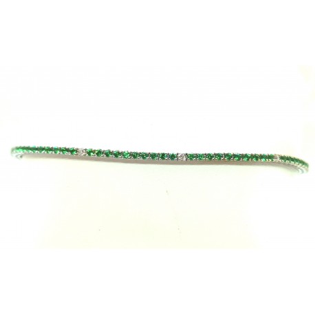 Tennis bracelet in 18kt gold with emeralds and diamonds