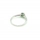 Solitaire ring in 18kt gold with emerald and diamonds