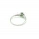 Solitaire ring in 18kt gold with emerald and diamonds