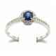 Solitaire ring in 18kt gold with sapphire and diamonds