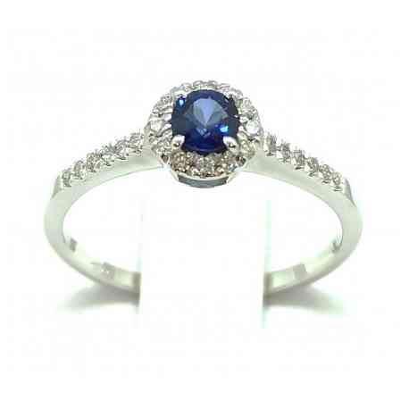 Solitaire ring in 18kt gold with sapphire and diamonds