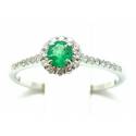 Solitaire ring in 18kt gold with emerald and diamonds