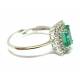 Ring with emerald 7 x 5 ct. 0.97 and diamonds
